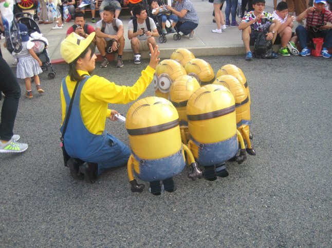 She must be the Minion handler! ;)